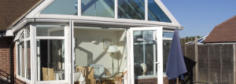 a house with lots of glass windows